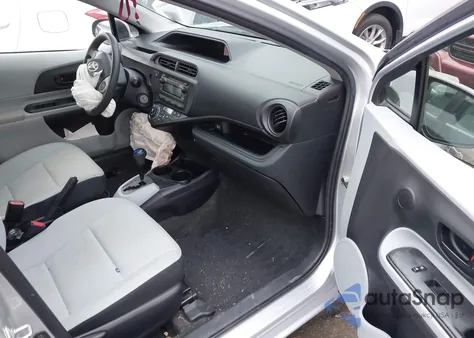 2012 Toyota Prius C One z USA, uszkodzony, nr VIN JTDKDTB39C1003953